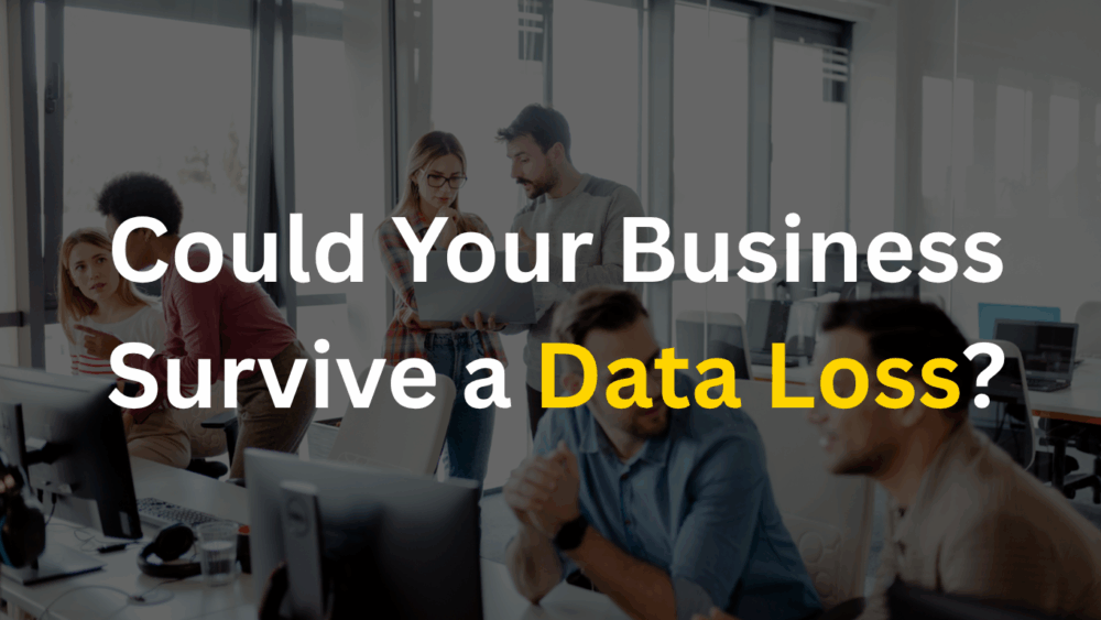 Small business team discussing IT security and backup solutions to prevent data loss.